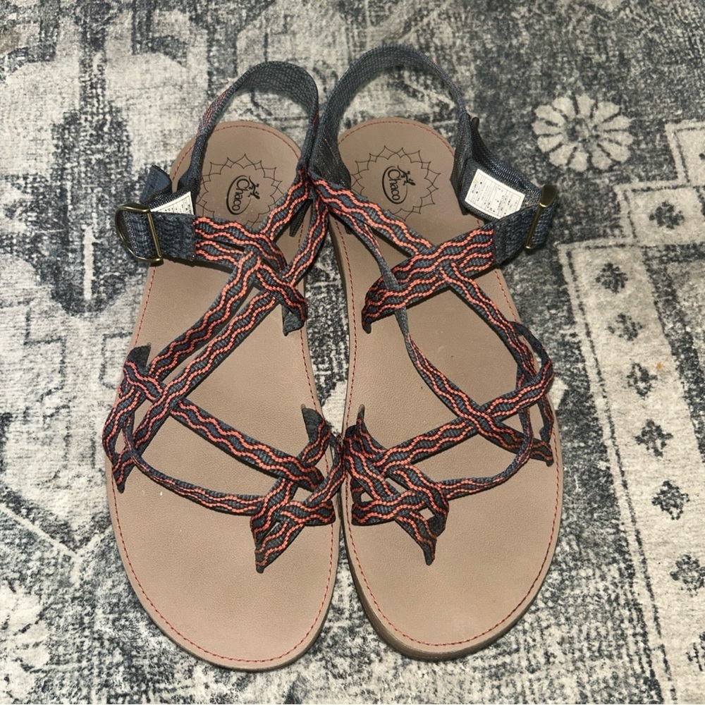 Chaco Black and Orange Sandals with Thong Design